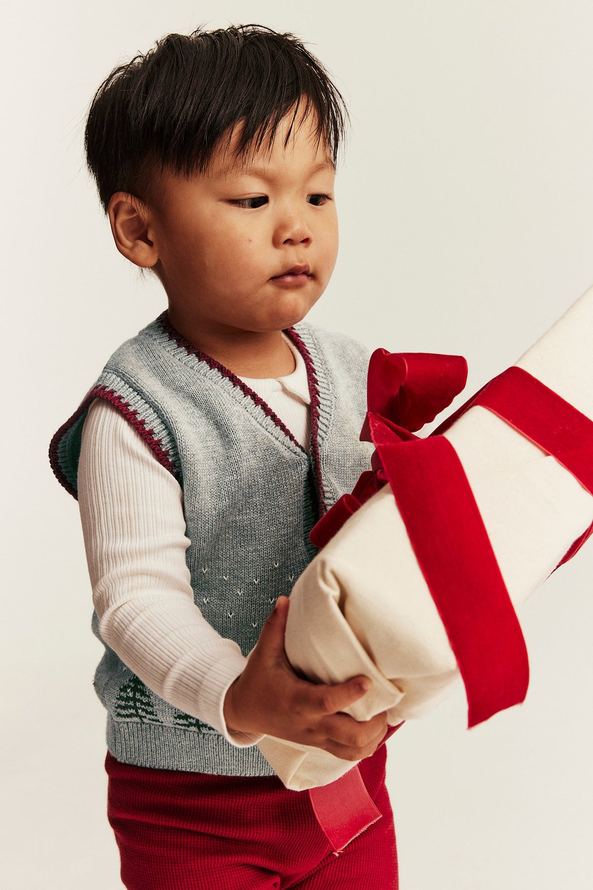 Baby grey knitted vest with Christmas motif