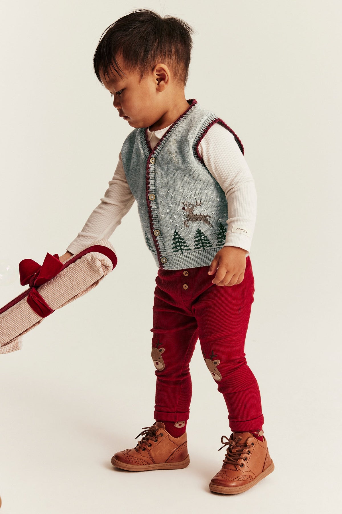 Baby grey knitted vest with Christmas motif